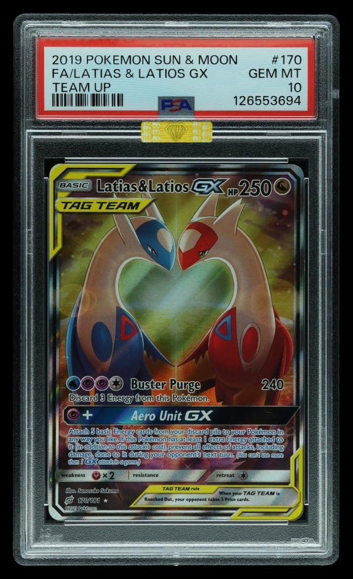 MBA's own example of a Gold Diamond: a PSA Gem Mint 10 2019 Team Up Latias & Latios GX full art, cert 126553694, with the gold holographic diamond sticker on the case directly below the PSA label